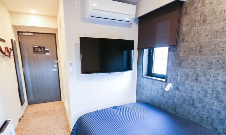 Imagen de la habitación del Hotel Livemax Toyama. Foto 6