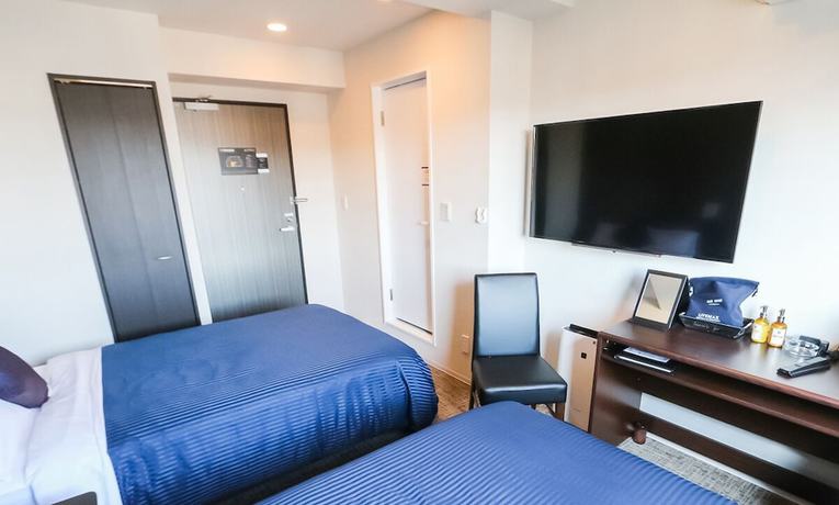 Imagen de la habitación del Hotel Livemax Toyama. Foto 9