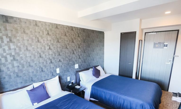 Imagen de la habitación del Hotel Livemax Toyama. Foto 11
