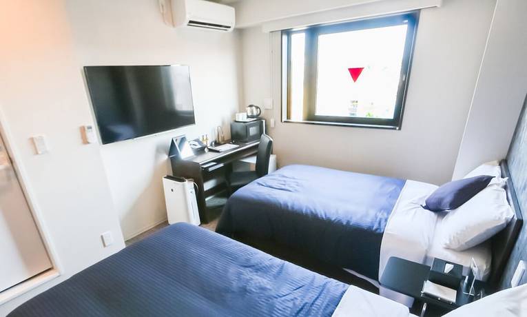 Imagen de la habitación del Hotel Livemax Toyama. Foto 13