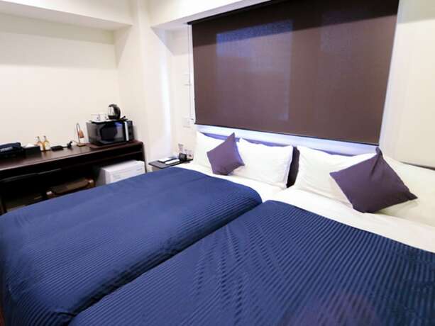 Imagen de la habitación del Hotel Livemax Ueno-ekimae. Foto 22