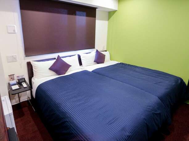 Imagen de la habitación del Hotel Livemax Ueno-ekimae. Foto 24