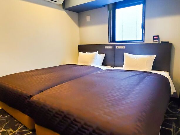Imagen de la habitación del Hotel Livemax Yokohama Stadium Mae. Foto 12