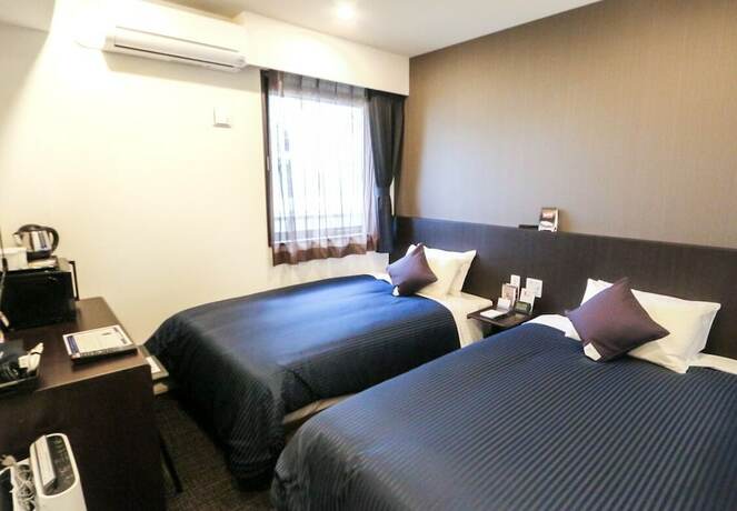 Imagen de la habitación del Hotel Livemax Yokohama Stadium Mae. Foto 13