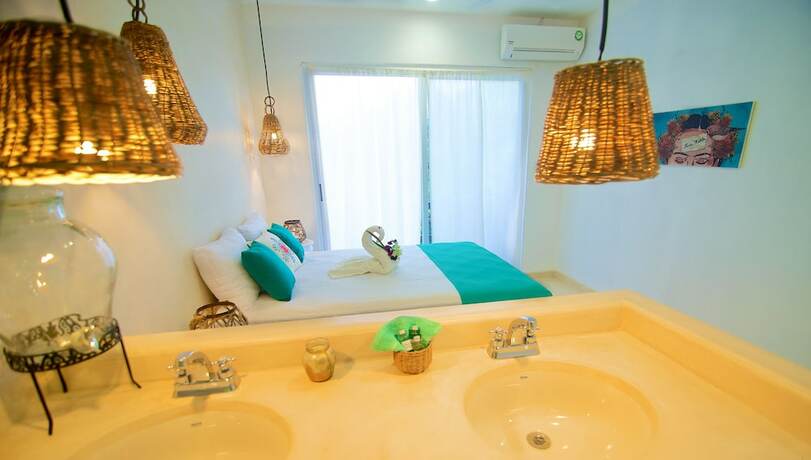 Imagen de la habitación del Hotel Livetulum. Foto 15