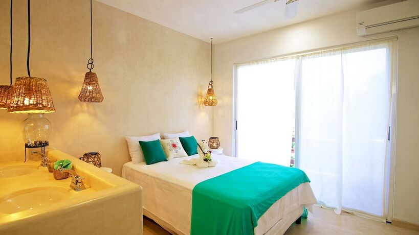 Imagen de la habitación del Hotel Livetulum. Foto 16