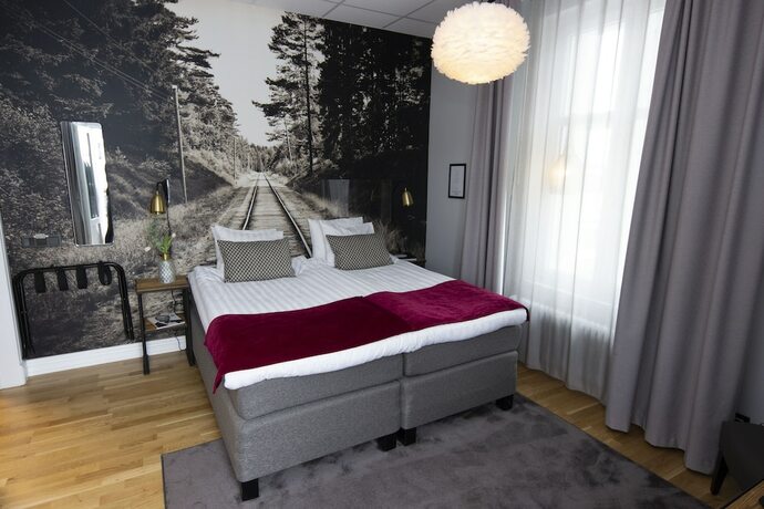 Imagen de la habitación del Hotel Livin Station. Foto 11