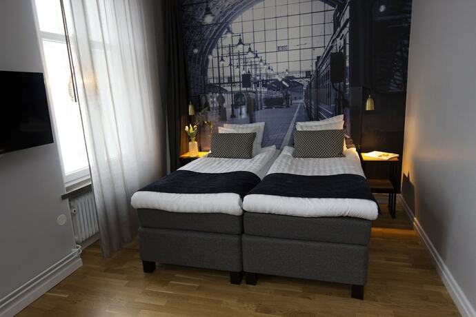 Imagen de la habitación del Hotel Livin Station. Foto 16