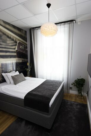 Imagen de la habitación del Hotel Livin Station. Foto 17