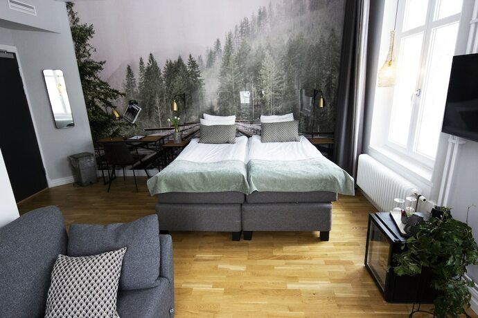 Imagen de la habitación del Hotel Livin Station. Foto 19