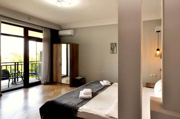 Imagen de la habitación del Hotel Livin, Tbilisi. Foto 4