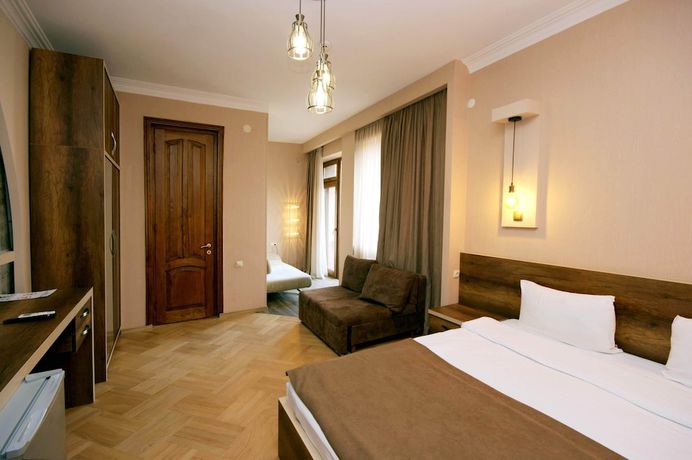 Imagen de la habitación del Hotel Livin, Tbilisi. Foto 15