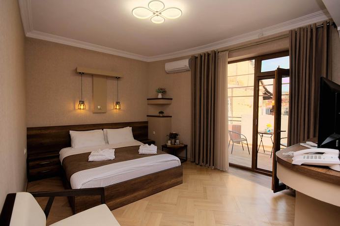 Imagen de la habitación del Hotel Livin, Tbilisi. Foto 17