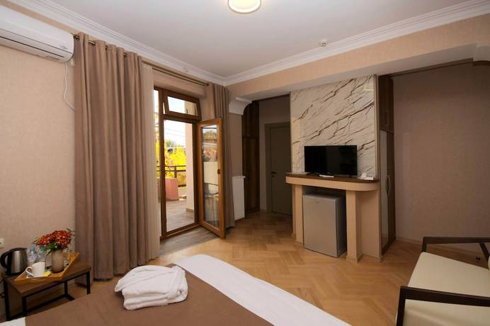 Imagen de la habitación del Hotel Livin, Tbilisi. Foto 18