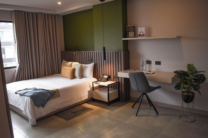 Imagen de la habitación del Hotel Living 35 Suites by Growing Group. Foto 5