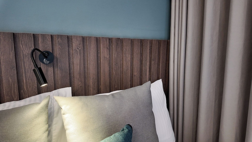 Imagen de la habitación del Hotel Living 35 Suites by Growing Group. Foto 7
