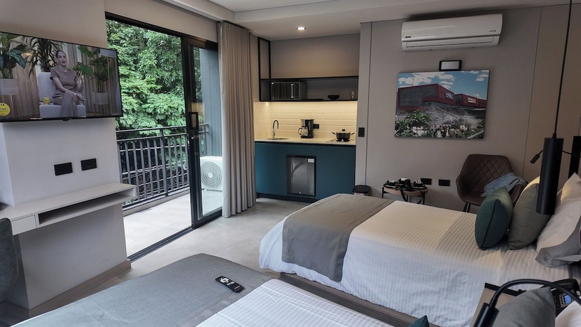 Imagen de la habitación del Hotel Living 35 Suites by Growing Group. Foto 10