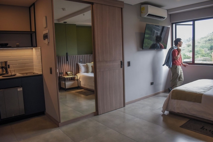 Imagen de la habitación del Hotel Living 35 Suites by Growing Group. Foto 12