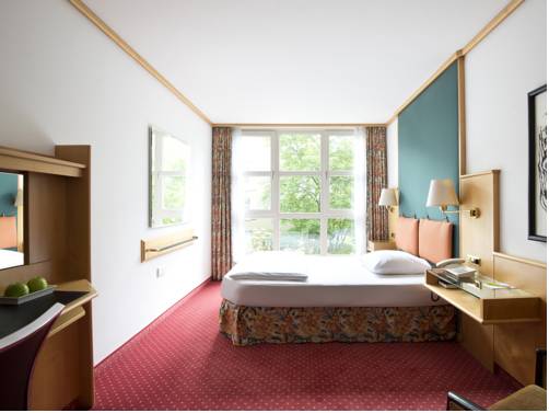Imagen de la habitación del Hotel Living Am Olympiapark. Foto 3