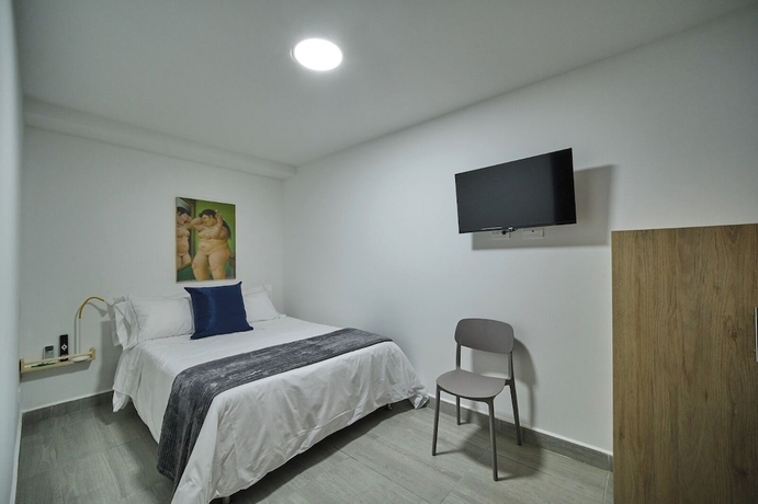 Imagen de la habitación del Hotel Living Blue. Foto 3