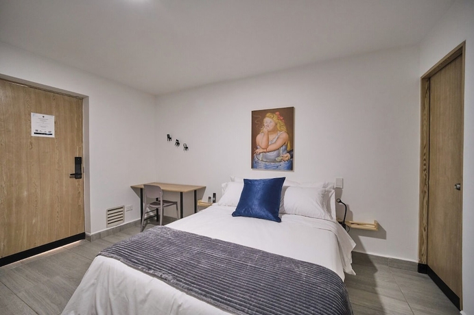 Imagen de la habitación del Hotel Living Blue. Foto 4