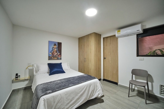 Imagen de la habitación del Hotel Living Blue. Foto 5