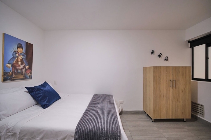 Imagen de la habitación del Hotel Living Blue. Foto 6