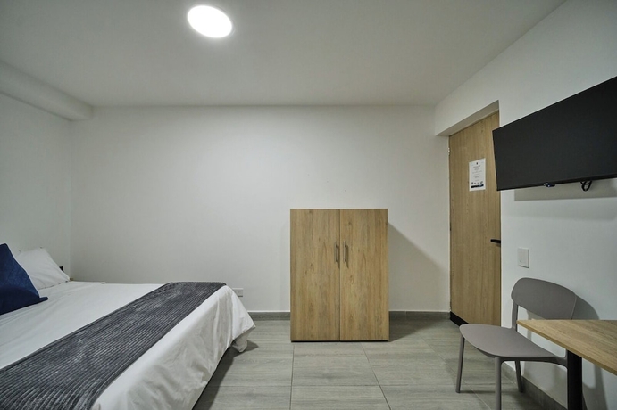 Imagen de la habitación del Hotel Living Blue. Foto 9