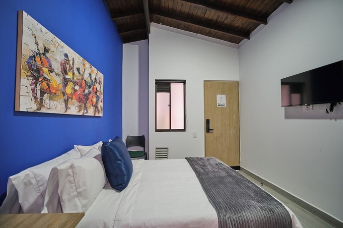 Imagen de la habitación del Hotel Living Blue. Foto 11