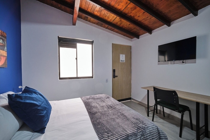 Imagen de la habitación del Hotel Living Blue. Foto 12