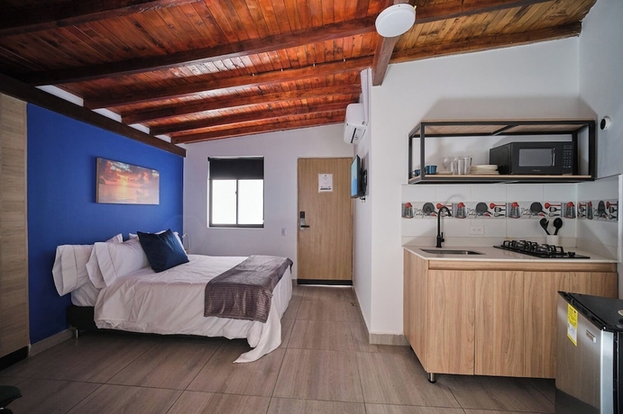 Imagen de la habitación del Hotel Living Blue. Foto 13