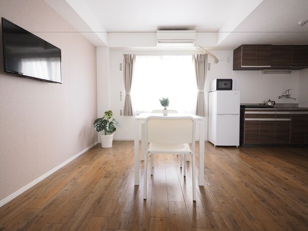 Imagen de la habitación del Hotel Living CUBE Tabata Station. Foto 29