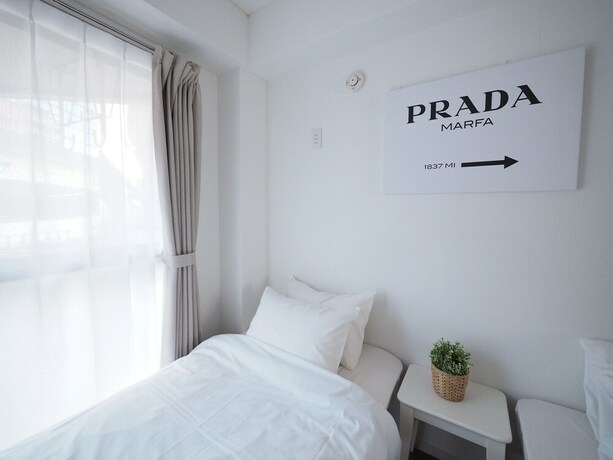 Imagen de la habitación del Hotel Living CUBE Tabata Station. Foto 33