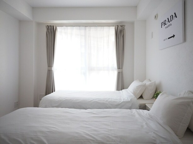 Imagen de la habitación del Hotel Living CUBE Tabata Station. Foto 34