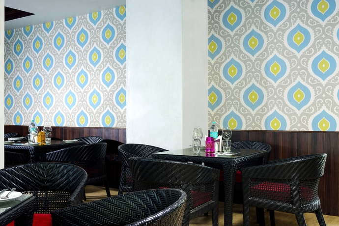 Imagen del bar/restaurante del Hotel Living Room By Seasons Hotels. Foto 4