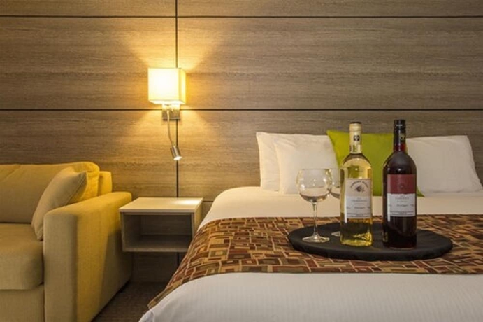 Imagen de la habitación del Hotel Living Stone Golf Resort. Foto 7