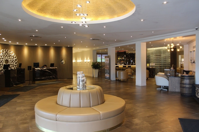 Imagen de los interiores del Hotel Living Stone Golf Resort. Foto 18
