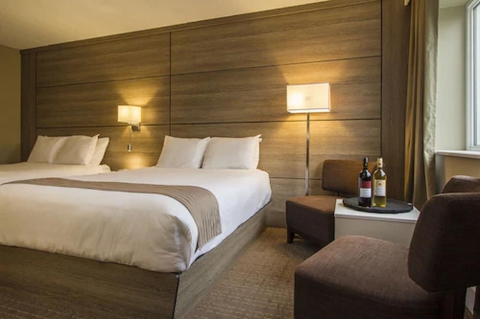 Imagen de la habitación del Hotel Living Stone Golf Resort. Foto 15