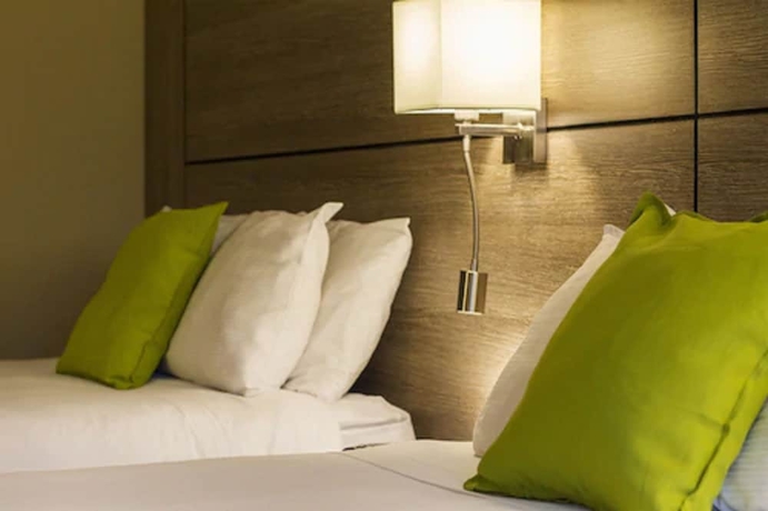 Imagen de la habitación del Hotel Living Stone Golf Resort. Foto 16