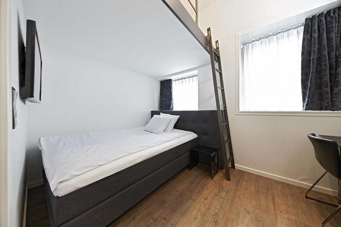 Imagen de la habitación del Hotel Living Suites. Foto 4
