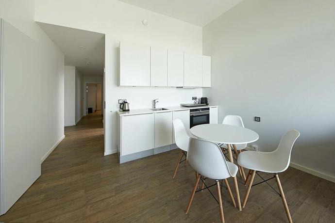 Imagen de los interiores del Hotel Living Suites. Foto 17