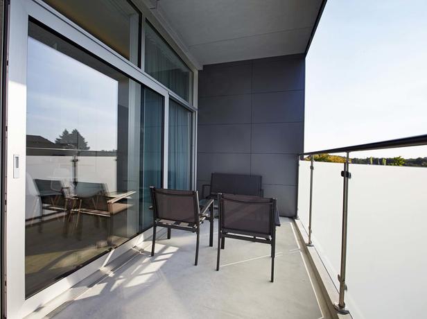 Imagen de los interiores del Hotel Living Suites. Foto 18