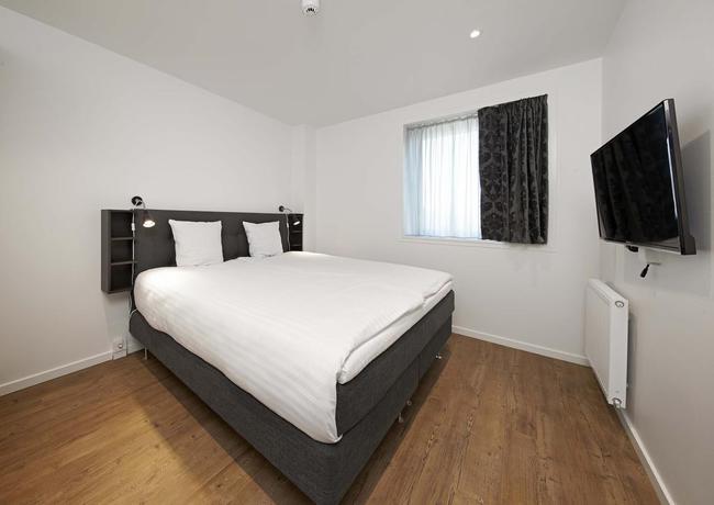 Imagen de la habitación del Hotel Living Suites. Foto 5