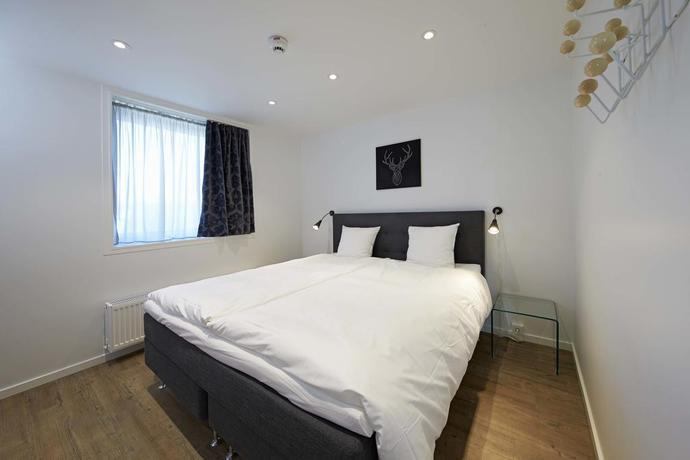 Imagen de la habitación del Hotel Living Suites. Foto 6