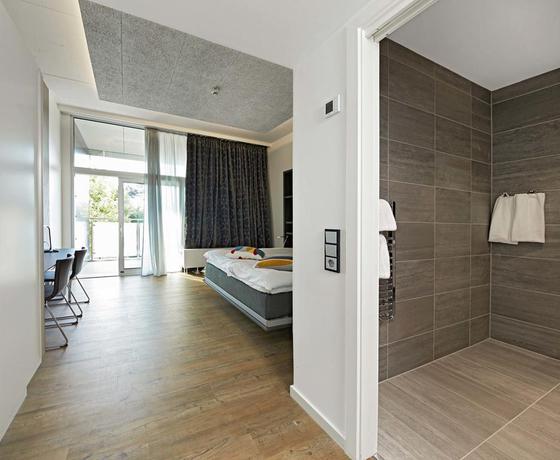 Imagen de la habitación del Hotel Living Suites. Foto 7