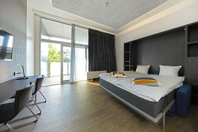 Imagen de la habitación del Hotel Living Suites. Foto 8