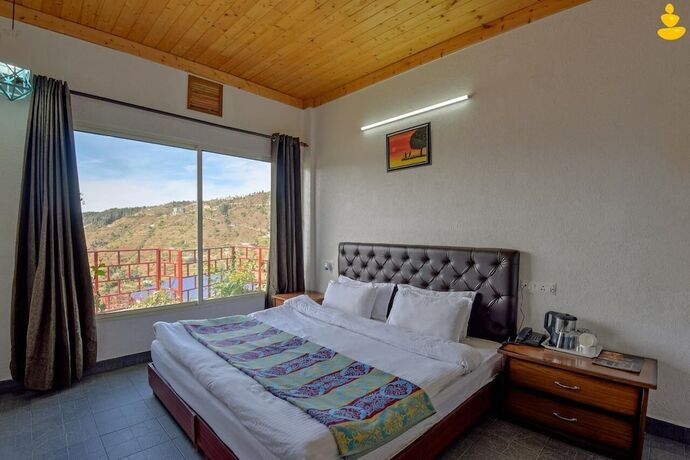 Imagen de la habitación del Hotel Livingstone Eco Resort Shimla. Foto 19
