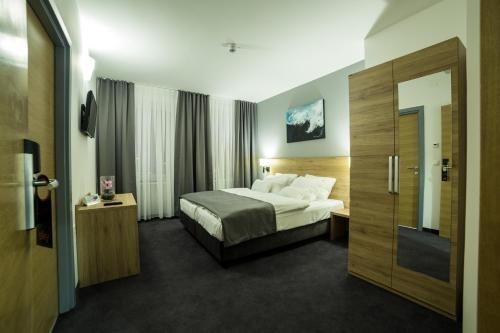 Imagen de la habitación del Hotel Livinn. Foto 10