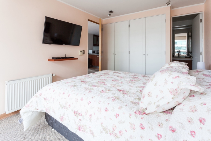 Imagen de la habitación del Hotel Livinnest Apartments En Manquehue. Foto 15