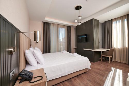 Imagen de la habitación del Hotel Livinton. Foto 7